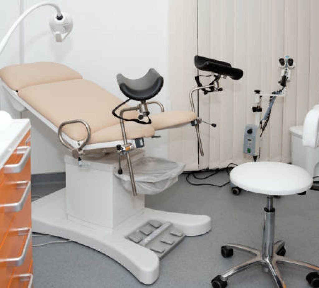 Gynecological cabinet with chair and other medical equipment in modern clinic. Equipment medicine, medical furniture, hospital, genicology, women's consultation.